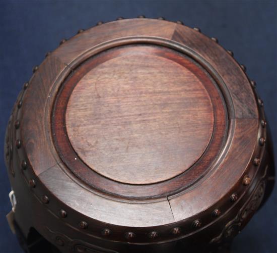 A pair of Chinese hongmu barrel shaped stools, late 19th / early 20th century, H.46cm Diameter 43cm